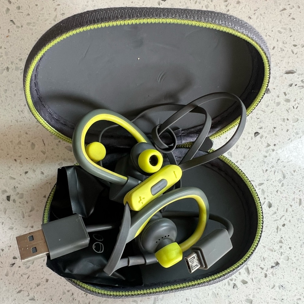 POWERBEATS3 ⚡️ Headphones with lime green accent color